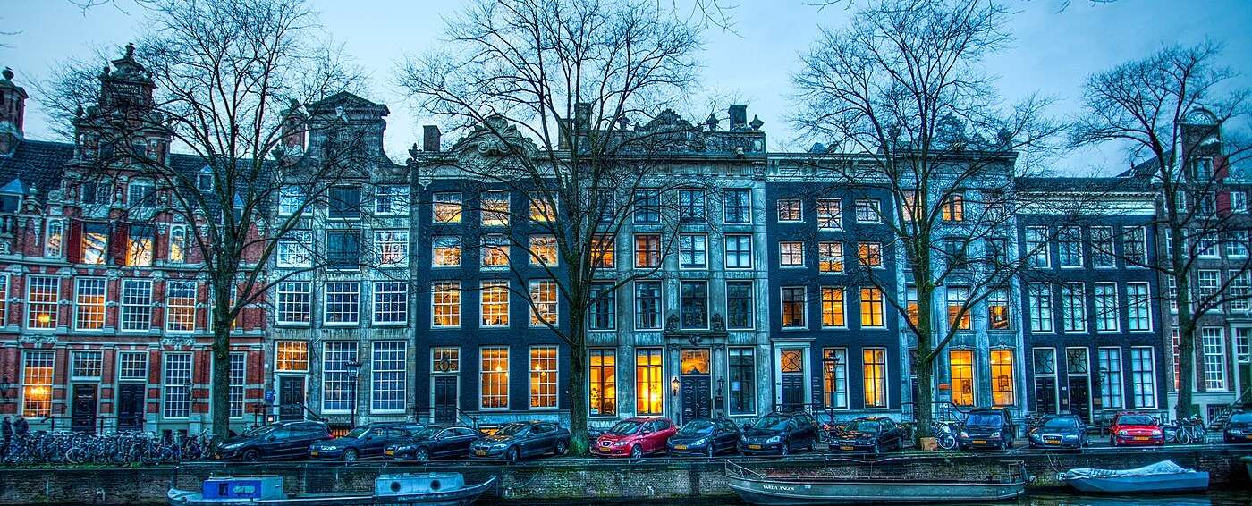 Gabled 17th-century canal houses along a canal in central Amsterdam