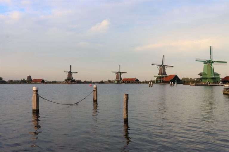 Traditional windmills along the water at Zaanse Schans