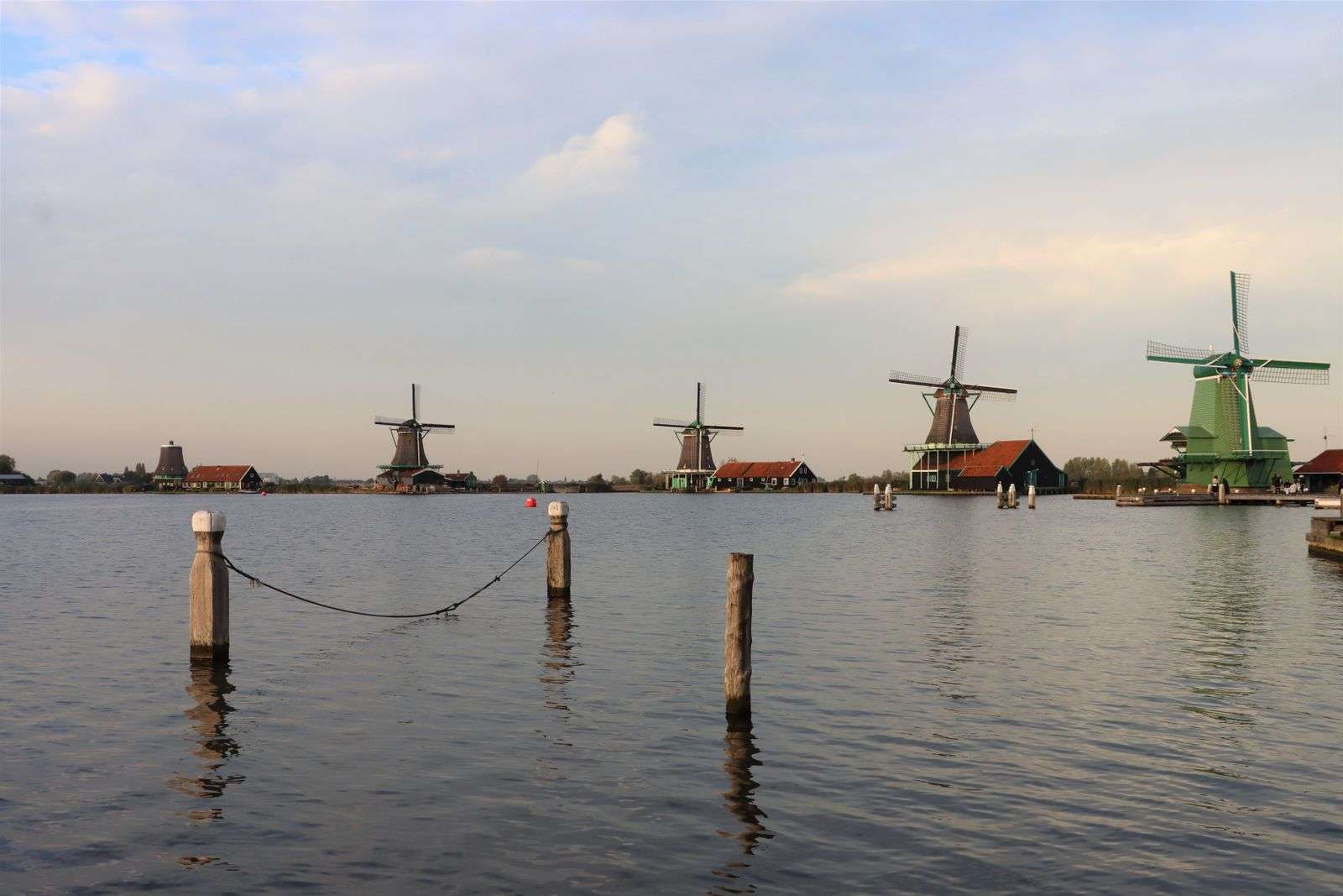 Traditional windmills along the water at Zaanse Schans