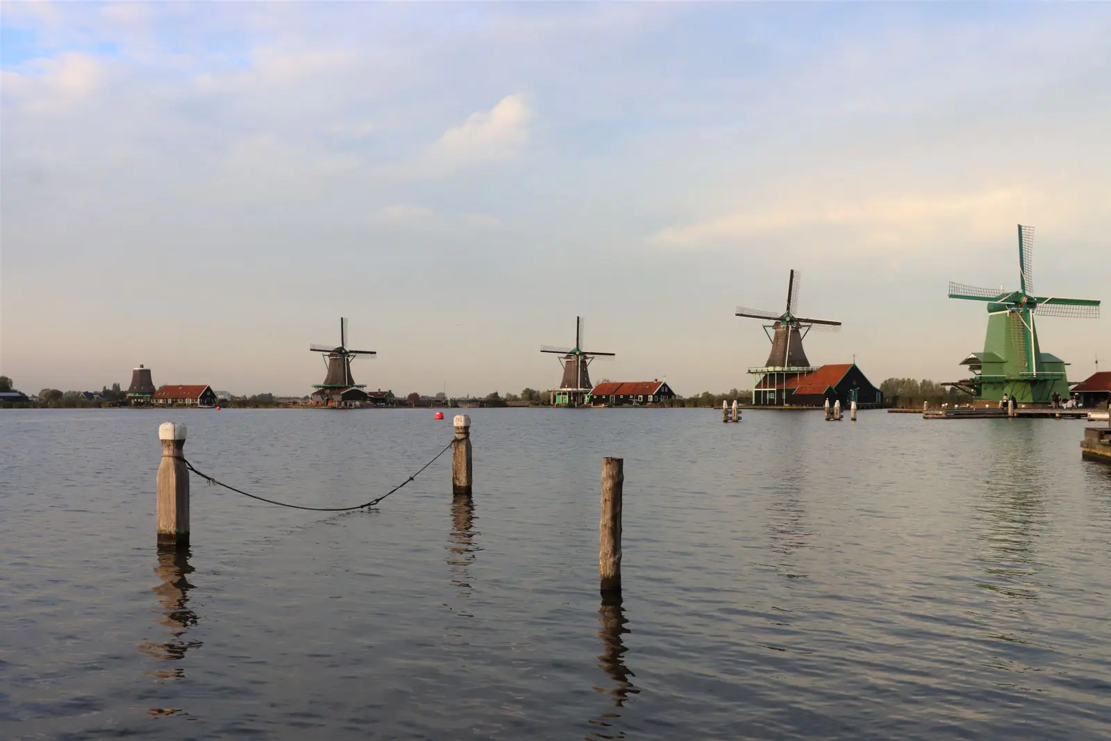 Traditional windmills along the water at Zaanse Schans